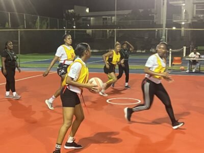 South Camp Road Rebels, Wing Defense attempting to make a pass. Game day was on Friday December 12th, 2025 at the Scotiabank Sports Club vs World Ward 1