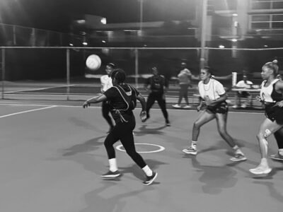 Center for the World Ward 1 team attempts to catch the ball during the Sutherland SPICE Netball Competition on Friday December 12th 2025 against South Camp Road Rebels